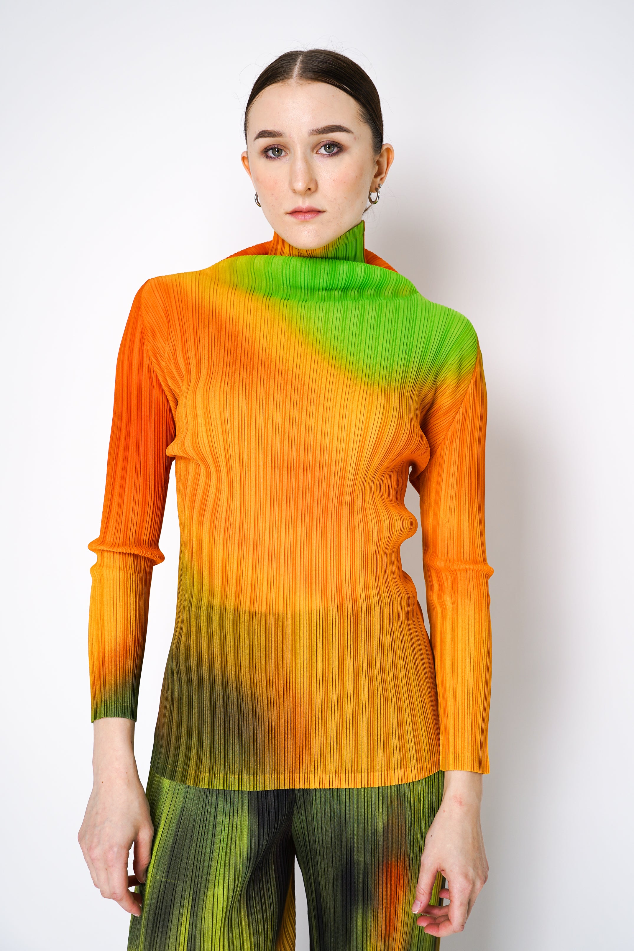 Pleats Please Issey Miyake Melty Rib Turtleneck Top in Orange and Green