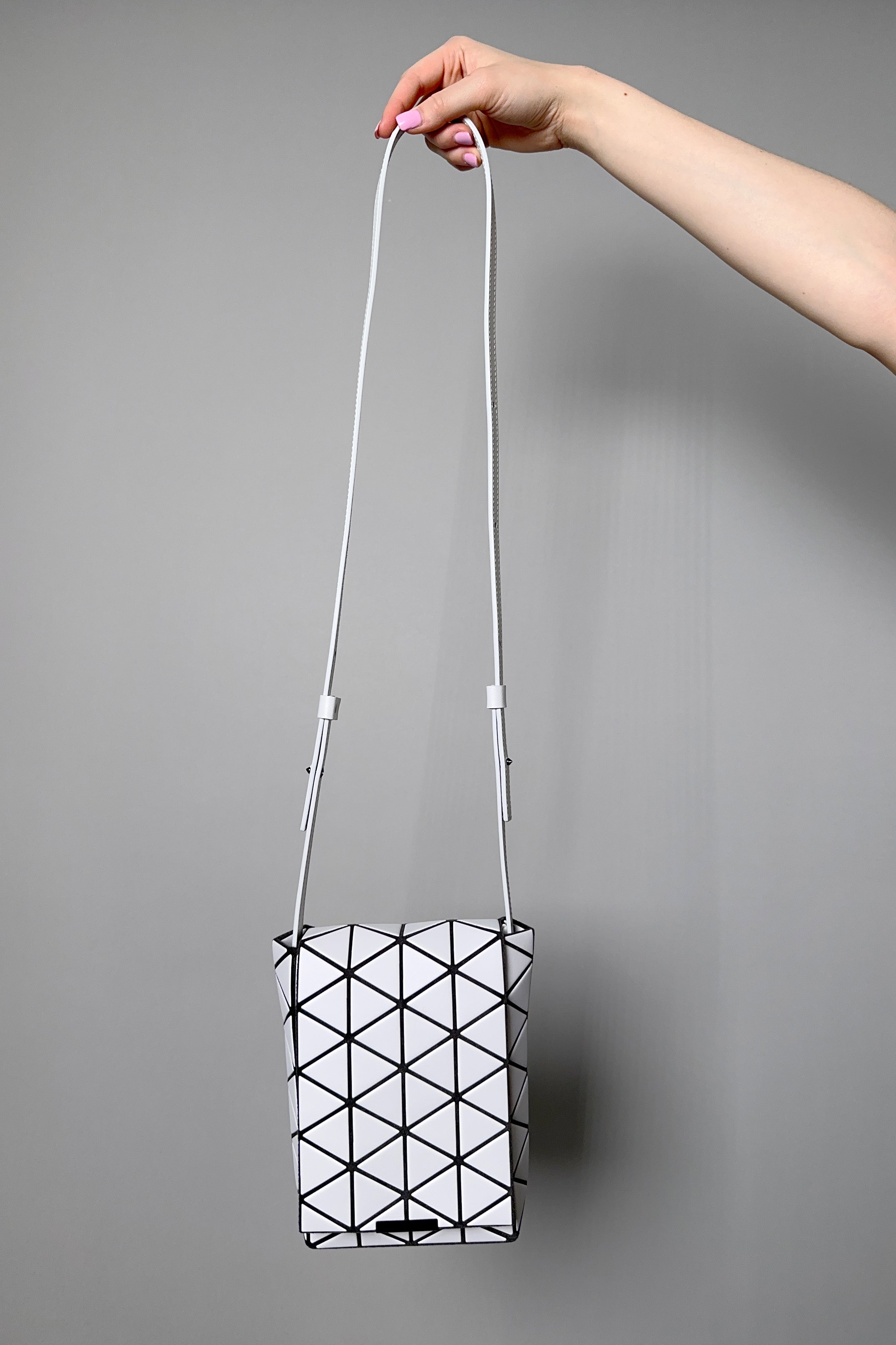 Issey miyake online sling bag