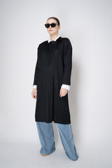 Pleats Please Issey Miyake Monthly Colors: February Collared Coat in Black Vancouver. Shop Online or in Store.