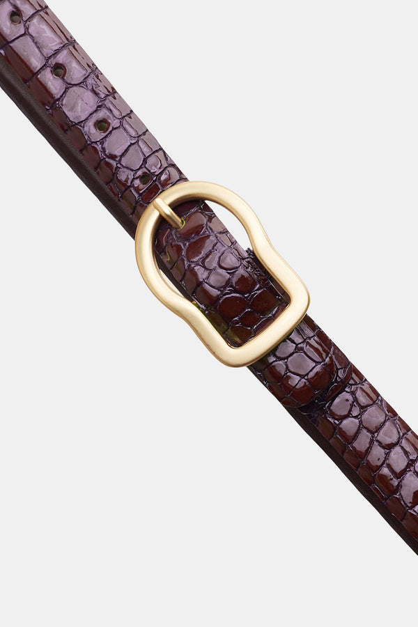 Dorothee Schumacher Reversible Belt With Signature Buckle in Dark Burgundy Vancouver. Shop Online or in Store. 