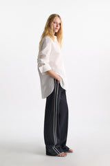 Dorothee Schumacher Wide Leg Track Pants with Knit Side Stripes in Navy Vancouver. Shop Online or in Store.