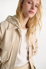 Dorothee Schumacher Waterproof Hooded Shrug in Light Sand Vancouver. Shop Online or in Store.