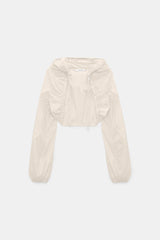 Dorothee Schumacher Waterproof Hooded Shrug in Light Sand Vancouver. Shop Online or in Store.