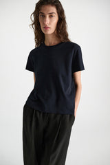 Dorothee Schumacher Stretch Cotton T-shirt with Back Pompom Detail in Navy