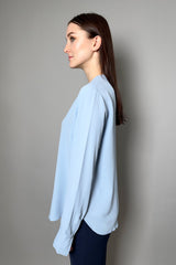 Antonelli Aversa Silk Crepe Long Sleeve Top in Sky Blue Vancouver. Shop Online or in Store.
