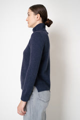 Amina Rubinacci 100% Cashmere High Neck Zip Cardigan in Indigo Melange Vancouver. Shop Online or in Store.