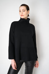 Amina Rubinacci Relaxed Fit Knit Wool Turtleneck in Black Vancouver. Shop Online or in Store.