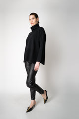 Amina Rubinacci Relaxed Fit Knit Wool Turtleneck in Black Vancouver. Shop Online or in Store.