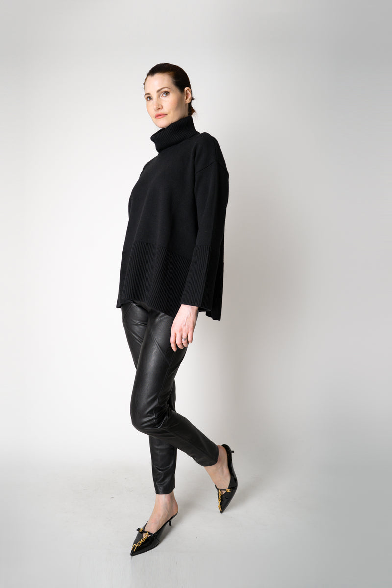 Amina Rubinacci Relaxed Fit Knit Wool Turtleneck in Black Vancouver. Shop Online or in Store.