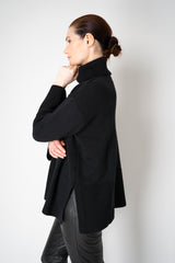 Amina Rubinacci Relaxed Fit Knit Wool Turtleneck in Black Vancouver. Shop Online or in Store.