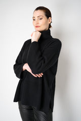 Amina Rubinacci Relaxed Fit Knit Wool Turtleneck in Black Vancouver. Shop Online or in Store.