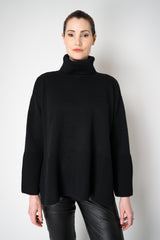 Amina Rubinacci Relaxed Fit Knit Wool Turtleneck in Black Vancouver. Shop Online or in Store.