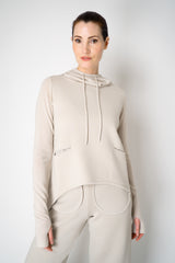 Annette Gortz Knit Merino Wool O-Shape Hemline Hooded Pullover in Beige Vancouver. Shop Online or in Store.