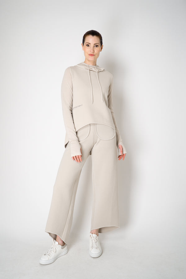 Annette Gortz Knit Merino Wool O-Shape Hemline Hooded Pullover in Beige Vancouver. Shop Online or in Store.