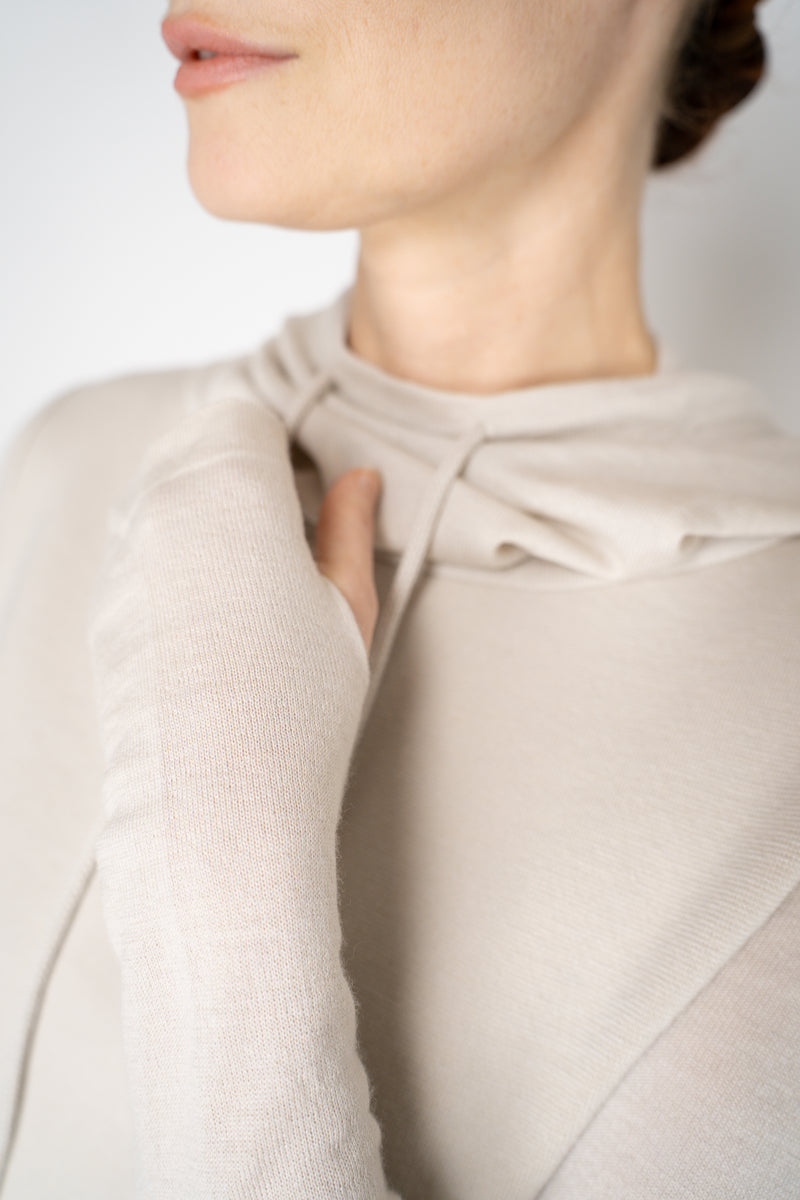 Annette Gortz Knit Merino Wool O-Shape Hemline Hooded Pullover in Beige Vancouver. Shop Online or in Store.