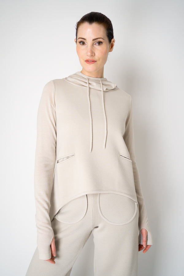 Annette Gortz Knit Merino Wool O-Shape Hemline Hooded Pullover in Beige Vancouver. Shop Online or in Store.