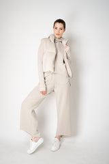 Annette Gortz Knit Merino Wool O-Shape Hemline Hooded Pullover in Beige Vancouver. Shop Online or in Store.