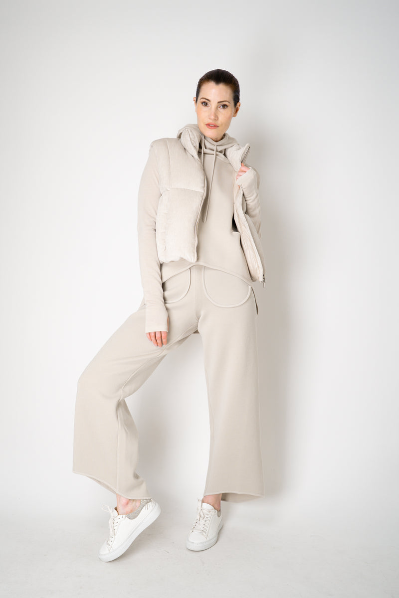Annette Gortz Knit Merino Wool O-Shape Hemline Hooded Pullover in Beige Vancouver. Shop Online or in Store.