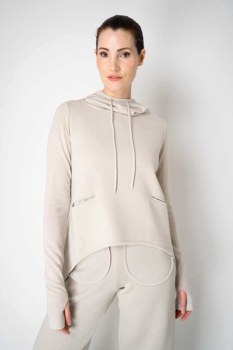 Annette Gortz Knit Merino Wool O-Shape Hemline Hooded Pullover in Beige Vancouver. Shop Online or in Store.