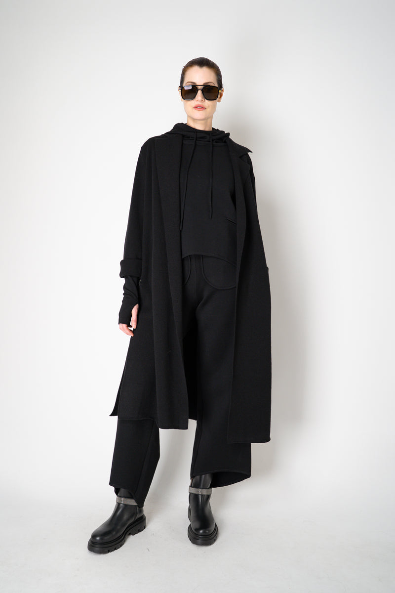Annette Gortz Knit Merino Wool O-Shape Hemline Hooded Pullover in Black Vancouver. Shop Online or in Store.