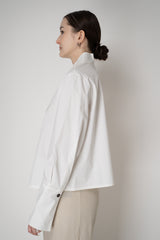 Annette Gortz Relaxed A-line Cotton Poplin Blouse with Open Notch Collar in White Vancouver. Shop Online or in Store.