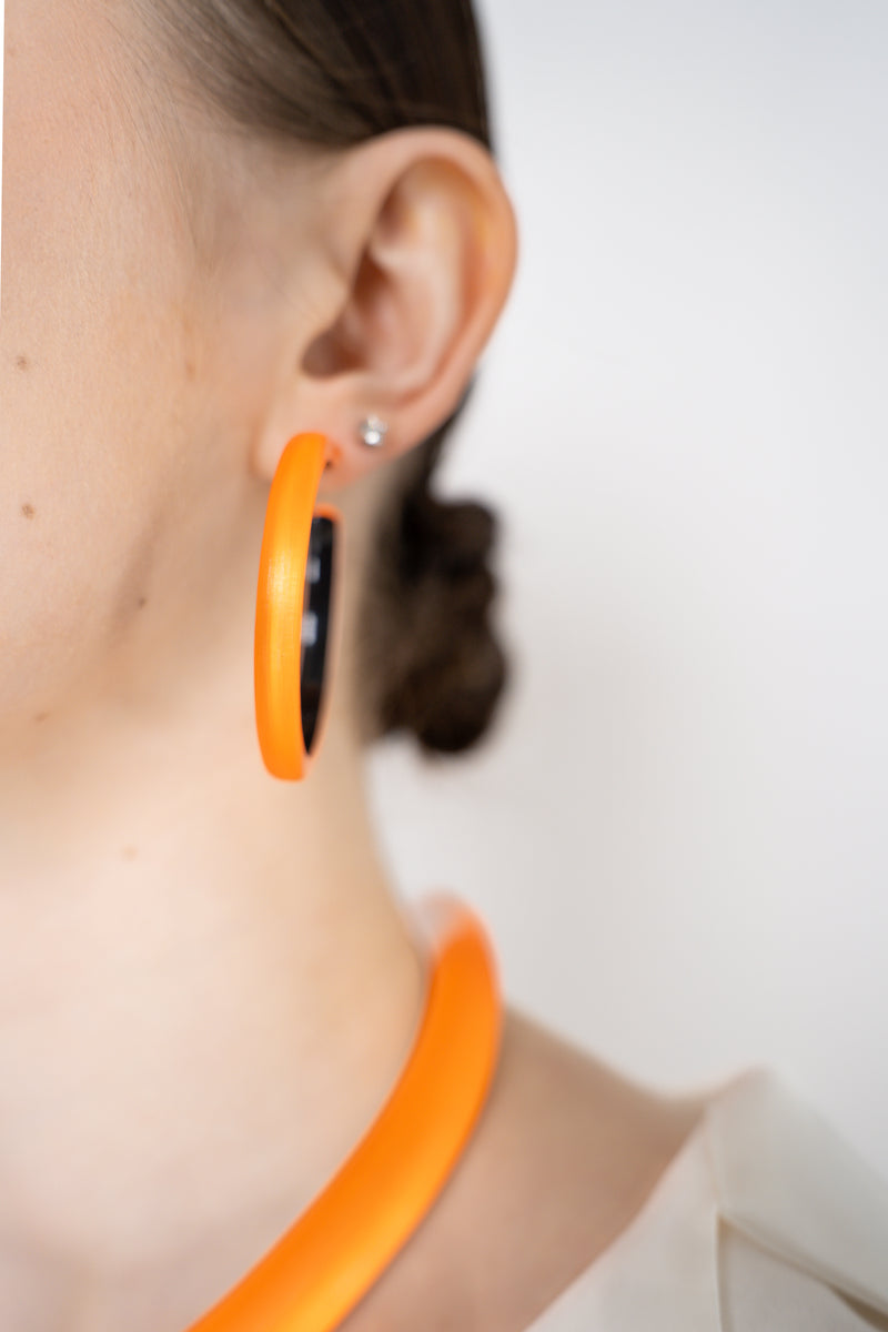 Alexis Bittar Skinny Lucite Hoop Earrings in Neon Orange
