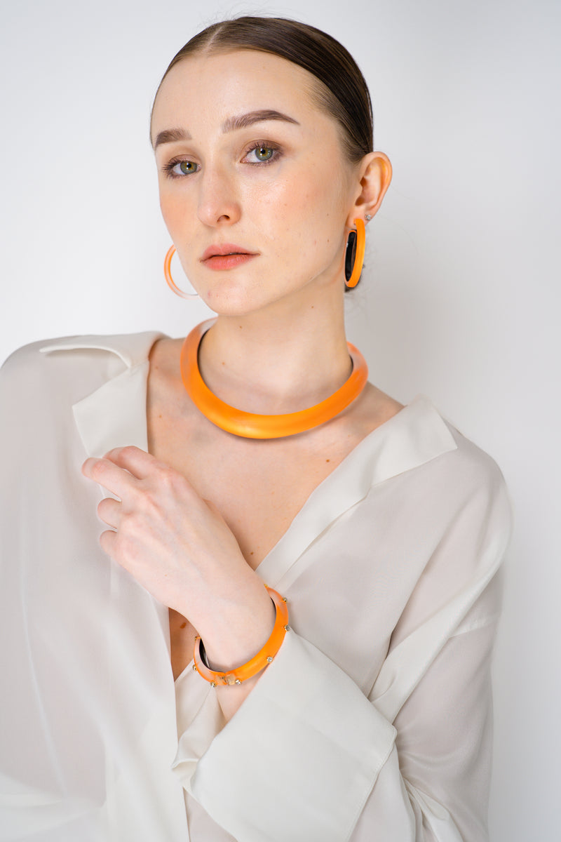 Alexis Bittar Skinny Lucite Hoop Earrings in Neon Orange