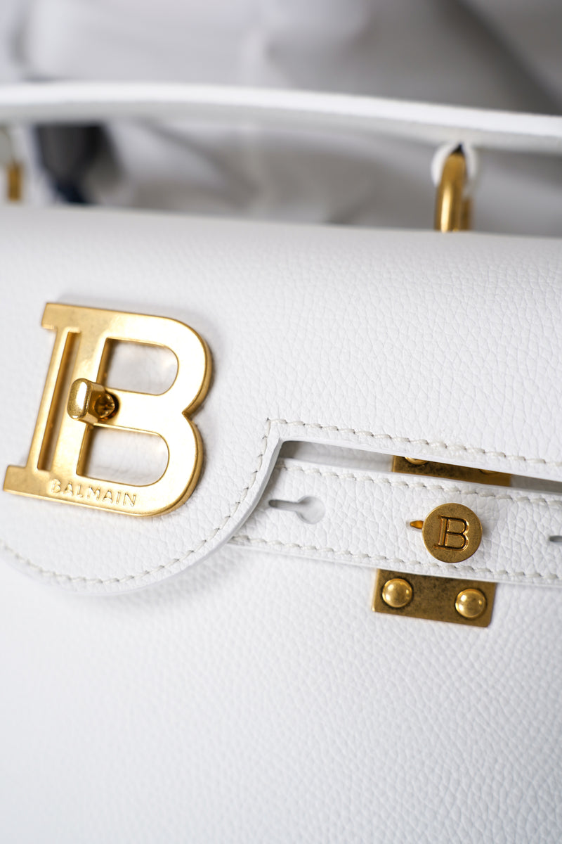 Balmain B-Buzz 23 Grained Leather Bag in White Vancouver. Shop Online or in Store.