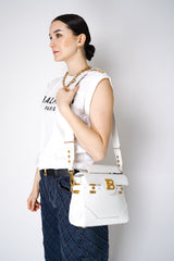 Balmain B-Buzz 23 Grained Leather Bag in White Vancouver. Shop Online or in Store.