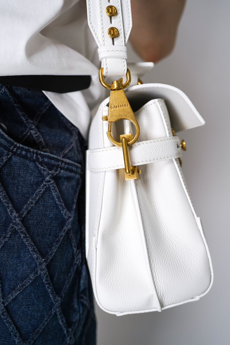 Balmain B-Buzz 23 Grained Leather Bag in White Vancouver. Shop Online or in Store.