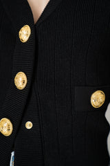 Balmain Bold Shoulder Cropped Knit Cardigan in Black Vancouver. Shop Online or in Store.