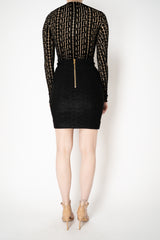 Balmain Bouclette Monogram Knee Length Skirt in Black Vancouver. Shop Online or in Store.