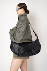 Balmain Ebene Large Hobo-Buffalo Leather Bag in Black Vancouver. Shop Online or in Store.