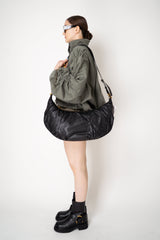 Balmain Ebene Large Hobo-Buffalo Leather Bag in Black Vancouver. Shop Online or in Store.