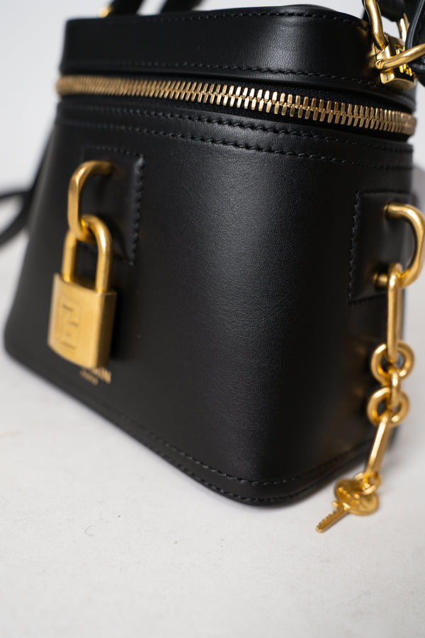 Balmain Lock and Key Vanity Calfskin Leather Bag in Black Vancouver. Shop Online or in Store.