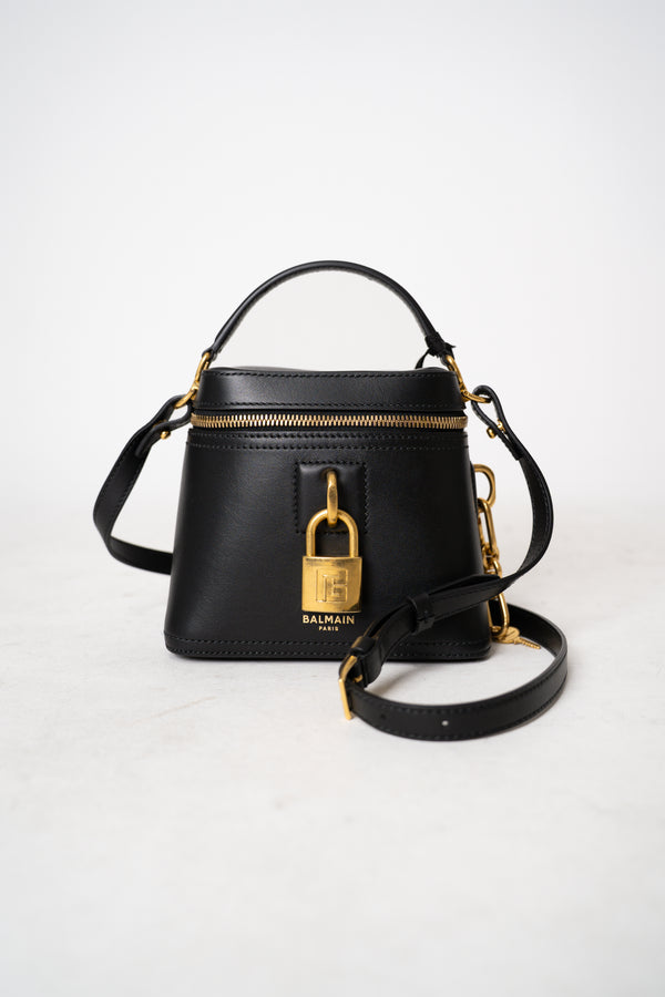 Balmain Lock and Key Vanity Calfskin Leather Bag in Black Vancouver. Shop Online or in Store.