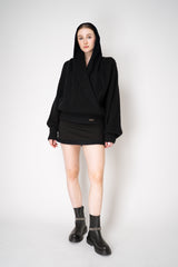 Balmain Oversized Knit Drapy Hooded Pullover in Black Vancouver. Shop Online or in Store.