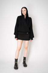 Balmain Oversized Knit Drapy Hooded Pullover in Black Vancouver. Shop Online or in Store.