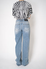 Balmain Straight Leg Faded Denim Jeans in Blue Vancouver. Shop Online or in Store.