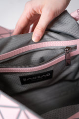 Bao Bao Issey Miyake Fossette Versatile Handbag and Crossbody Bag in Pink Vancouver. Shop Online or in Store.