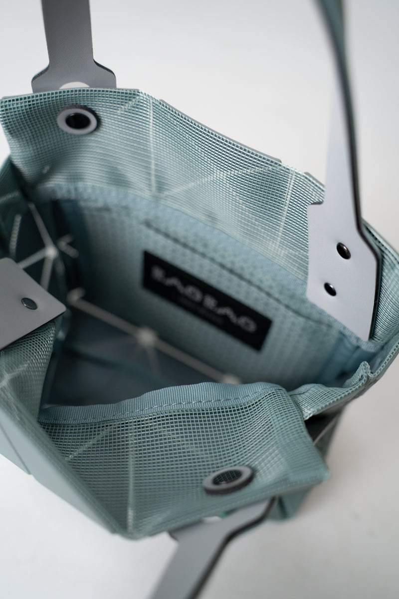 Bao Bao Issey Miyake Mini Carat Matte Hand Bag in Sage Green Vancouver. Shop Online or in Store.