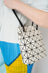 Bao Bao Issey Miyake Wring Gloss Shoulder Bag in Cream Vancouver. Shop Online or in Store.