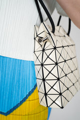 Bao Bao Issey Miyake Wring Gloss Shoulder Bag in Cream Vancouver. Shop Online or in Store.