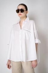 D. Exterior Cotton Poplin A-line Oversized Button-Up with Filo Diamante Embellished Pocket in White Vancouver. Shop Online or in Store.