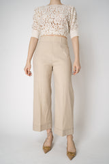 D. Exterior Cropped Wide Leg Linen Trousers with Beaded Cuffs in Blush Beige Vancouver. Shop Online or in Store.