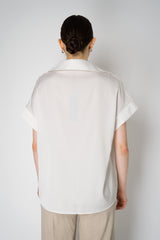 D. Exterior Sateen Fluid Drape Short Sleeve Blouse in White Vancouver. Shop Online or in Store.