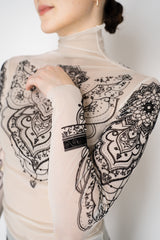 D. Exterior Stretch Tulle Turtleneck Henna Tattoo Top in White and Black Vancouver. Shop Online or in Store.
