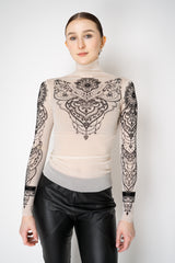 D. Exterior Stretch Tulle Turtleneck Henna Tattoo Top in White and Black Vancouver. Shop Online or in Store.