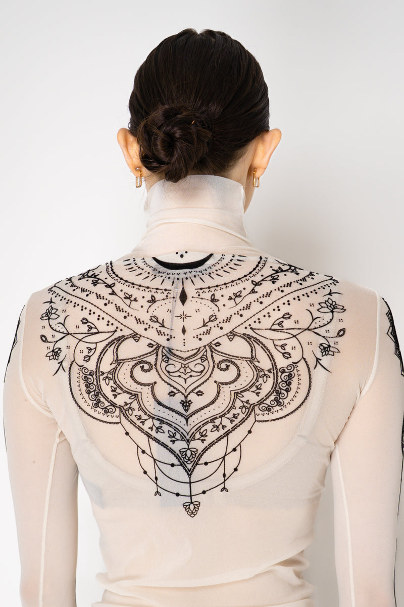 D. Exterior Stretch Tulle Turtleneck Henna Tattoo Top in White and Black Vancouver. Shop Online or in Store.