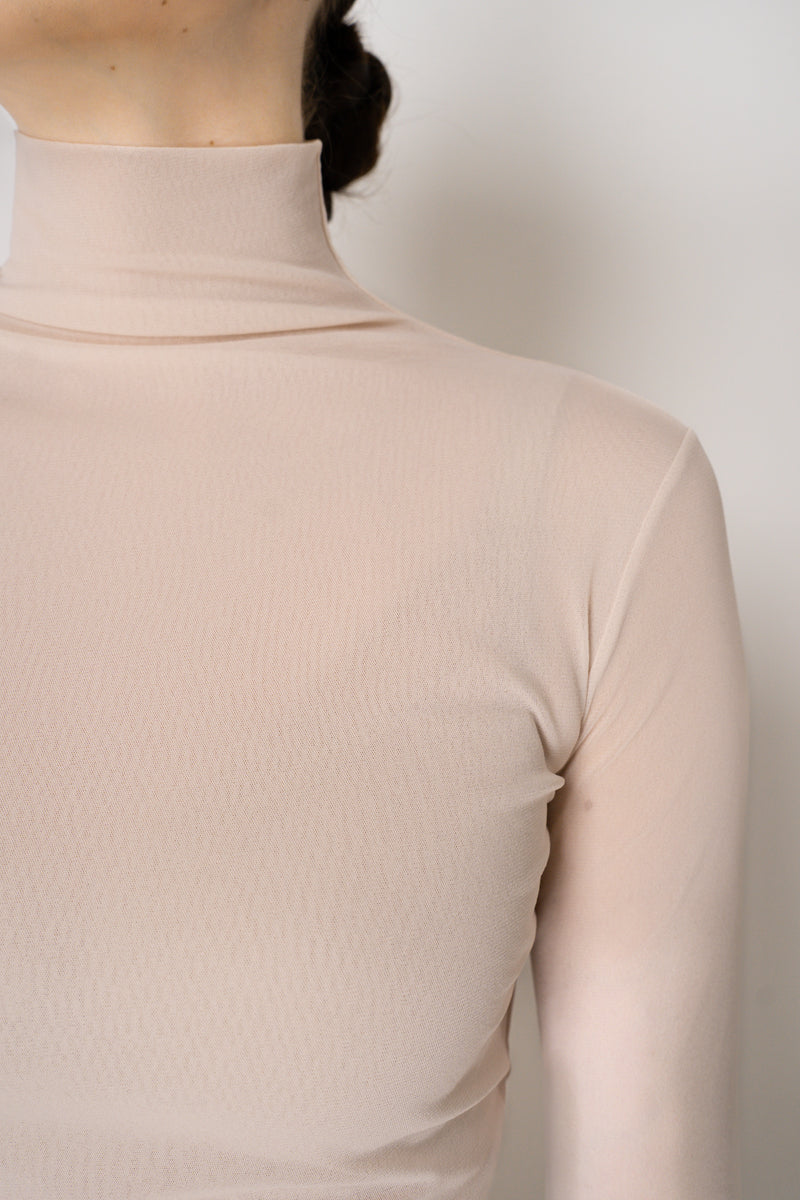 D. Exterior Stretch Tulle Turtleneck Top in Nude Pink Vancouver. Shop Online or in Store.